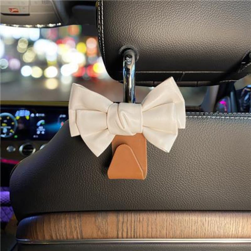 LIFOPY 2 Pack Car Purse Hooks, Cute Bow Car Seat Headrest Hook Hanger for Purses and Bags, Space-Saving Car Accessory (White brown) - Image 1